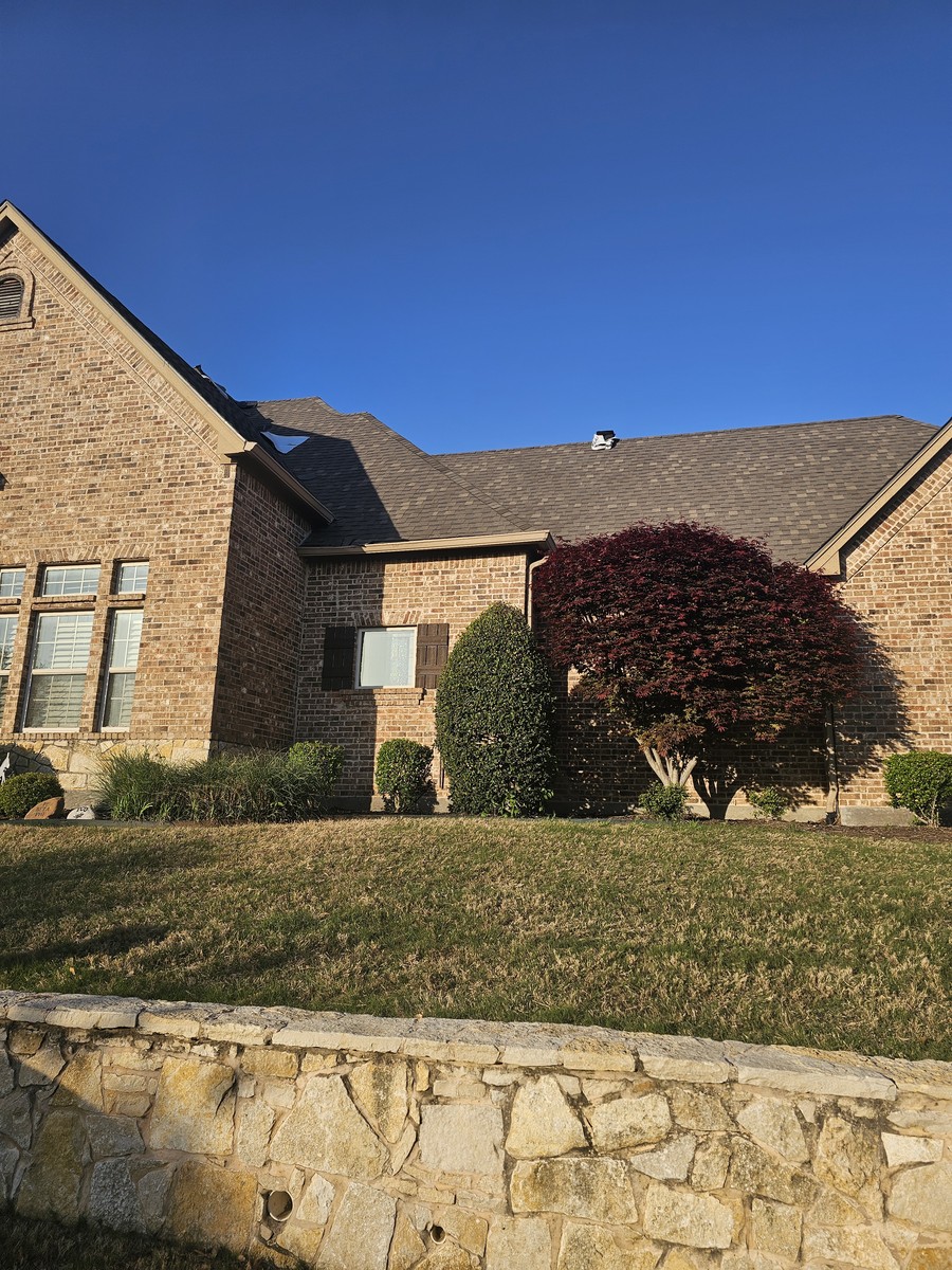 Upscale home with red maple and new roof in Johnson County, TX