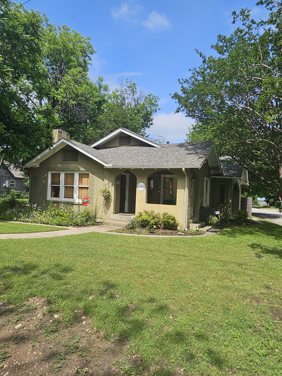 Burleson Old Town district home with mature trees and a recently replaced roof